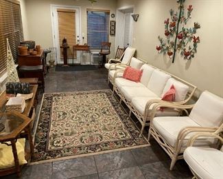   vintage five piece rattan set. Has never seen the outdoors