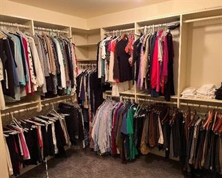 Closet full of women's/men's clothing 