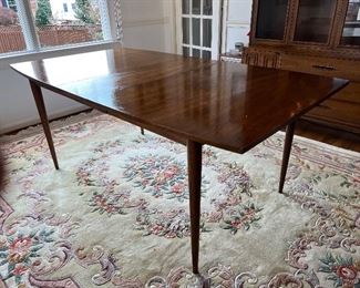 Broyhill Sculptra Walnut MCM dining table with 2 leaves  66"L x 40"W x 30"H - 2 additional leaves 12"L each