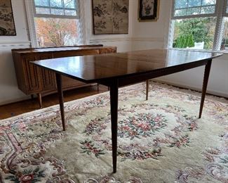 Broyhill Sculptra Walnut MCM dining table with 2 leaves  66"L x 40"W x 30"H - 2 additional leaves 12"L each