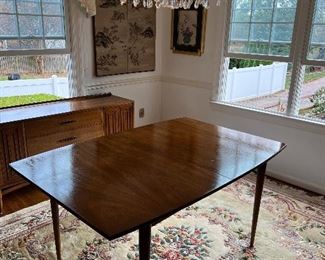 Broyhill Sculptra Walnut MCM dining table with 2 leaves  66"L x 40"W x 30"H - 2 additional leaves 12"L each