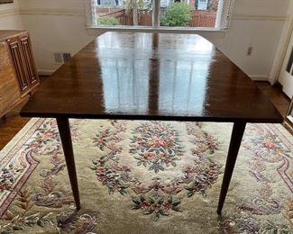 Broyhill Sculptra Walnut MCM dining table with 2 leaves  66"L x 40"W x 30"H - 2 additional leaves 12"L each