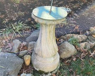 Outdoor concrete & brass sundial 