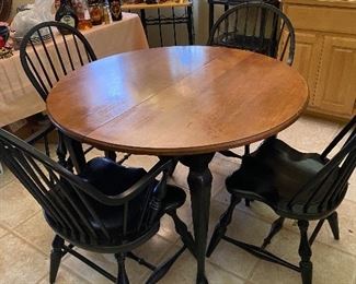 Dining table with 1 leaf and 4 chairs