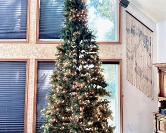 12' Pre-Lit Christmas Tree - All sections work - We were not tall enough to reach them :) 