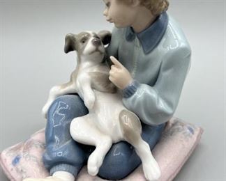 Lladro Boy Sitting with Dog Figurine