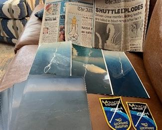 Single lot of never before seen series of photos of the Challenger disaster as well as arm patches and newspapers.