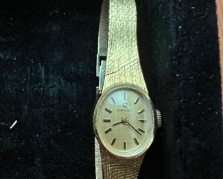 Woman’s solid gold 14k Omega watch 