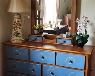 Dresser with painted accents, and Tole Style Lamp.