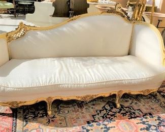 One of a pair of French style sofas