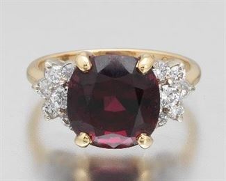 Ladies MCM Gold, Garnet and Diamond Ring 