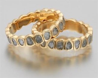 Ladies Pair of Gold and Diamond Eternity Bands 