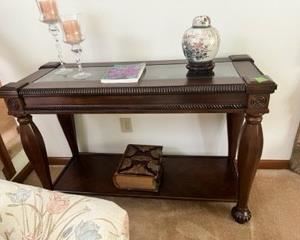 Large accent foyer or sofa table with intricate detail and beveled glass top 50"W x 20"D x "33"H