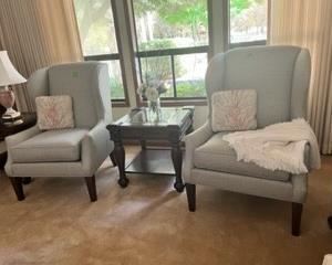 2 pristine dusty light blue wing chairs 31"W x 32"D x 43"H, cushions included