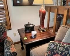 Side table, lamp, decorative items