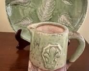 Portuguese ceramic pieces. Plate stand included.