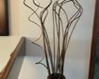 Gorgeous tall ceramic vase with decorative stick flora accents