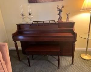 Upright Piano. Yours for $75. Needs some tuning, but in pristine outer condition. Hurricane oil lamps and decorative deer heads also for sale.