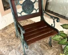 Outdoor cast iron and wood chair