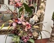 Gentle pastel toned floral in green pot