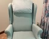 Very clean, tall backed wing chair.