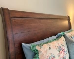 Detail of sleigh bed headboard. 