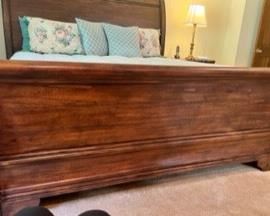 Detail of sleigh bed baseboard.
