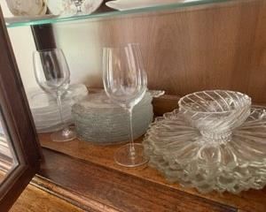 Various glass dish sets and wine glasses