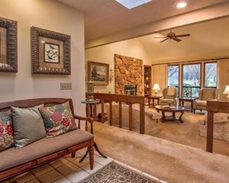 Upholstered custom bench, throw pillows, art, area rug (again, a view before it all sells)