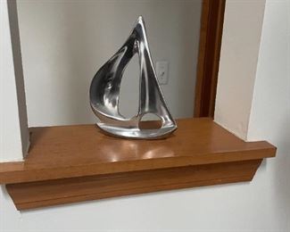 . . . a nice pewter sailboat