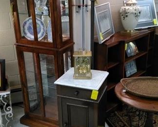 Wonderful lighted curio cabinet, marble top side cabinet, glass tray top side table, Tiffany style floor lamp.
