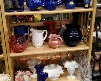 Cobalt blue items, art glass, milk, pottery pitcher and bowl.
