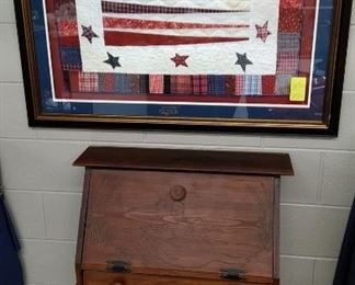 Framed quilted stars and stripes, drop front secretary with duck decoration.