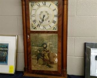 Antique weight driven wall clock.