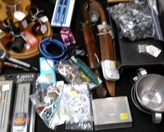 Men's cufflinks, metal soldiers, knives, hand carved wood Indian worrier and bearded man, pen/pencil sets, I pods, etc.