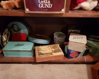 Many Metal  Tins and Paper Candy Boxes.Also Many Many Old Neusteter's and May D & F Boxes - Not Pictured but under Linen Table and Hat Boxes Above Hats 