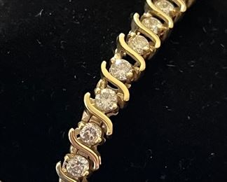 6.5 carat diamond tennis bracelet in 14k gold…$4800