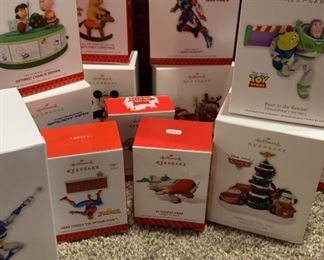 16 Hallmark Keepsake Ornaments Peanuts, Spiderman, Toy Story, Cars, and Pooh
