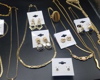 Collection of Gold Toned Jewelry 6 Necklaces, 3 Bracelets, 6 Pairs of Earrings, and 1 Ring