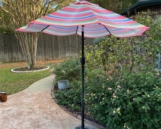 PATIO UMBRELLA WITH STAND.