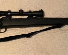 SAVAGE MODEL 110 LONG RANGE HUNTER IN 338 WIN MAG W/SIMMONS SCOPE.  CASH ONLY FOR GUN SALES.