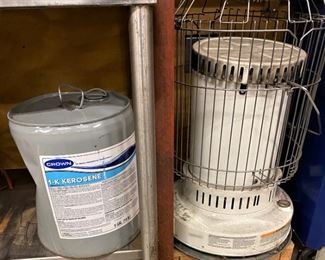 KEROSENE HEATER AND FULL 5 GALLONS OF KEROSENE.