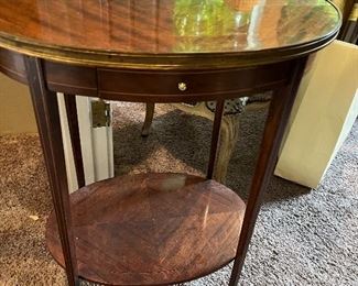 $540. Pair of oval antique tables with a single drawer. 
22"w x 16"d x 25"h