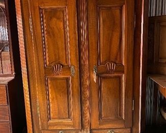 $400. 18th Century Louis XVI walnut armoire,  as found as seen by finish scratches at the base.  70"w x 24"d x 84"h.  Price has been reduced to reflect half off.  