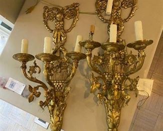 #11 $ 500 for the pair.  Brass gilded sconces three light. Price has been reduced to reflect half off. 