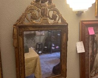 $600 antique mirror 18 inches wide by 21 inches high by 4 inches deep.
