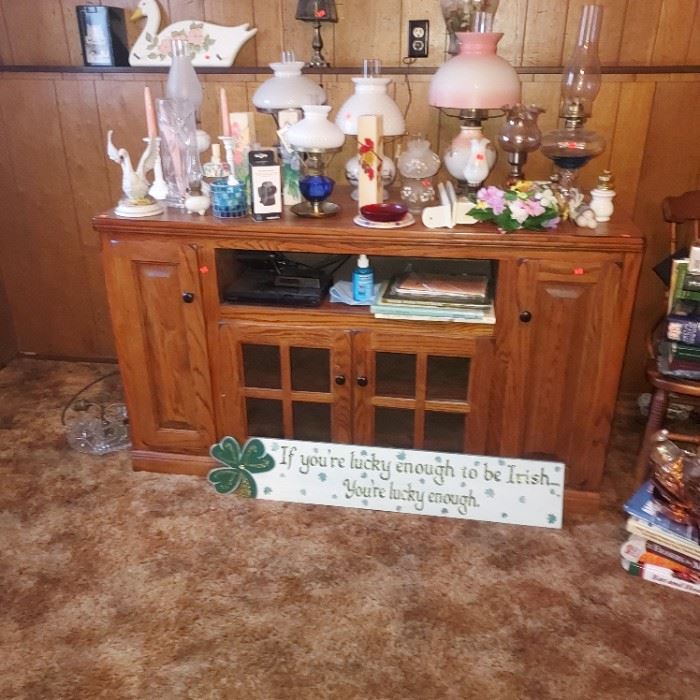 Solid wood entertainment center 
Oil lamps 