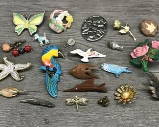 Multi colored brooches lot animals starfish butterflies $5 each or all for $50 
Lot B13