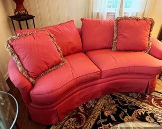 Vintage red curved sofa 