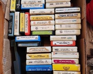 8 track tapes in container